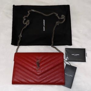 YSL CASSANDRE MATELASSÉ CHAIN WALLET IN GRAIN DE POUDRE EMBOSSED LEATHER